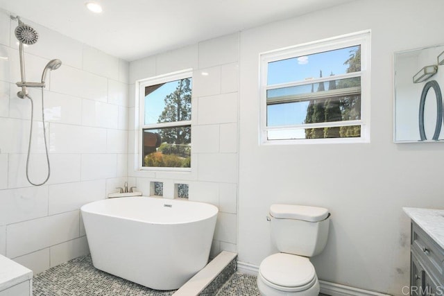 1736 Bellington Ln, Fallbrook, CA 92028 - full bath with vanity, a freestanding bath, and tile walls