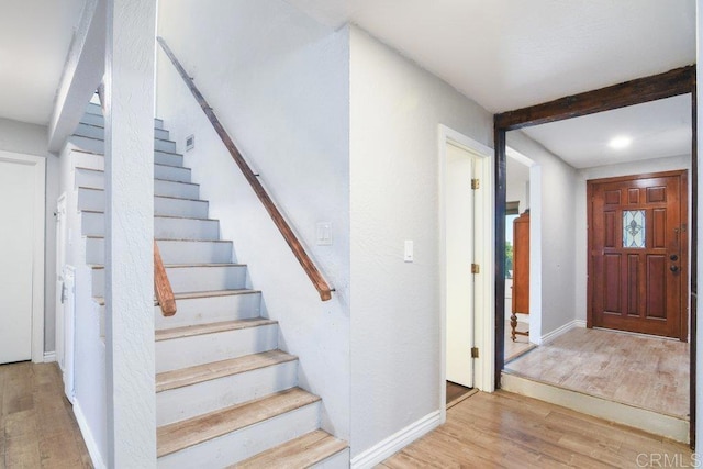 1736 Bellington Ln, Fallbrook, CA 92028 - entrance foyer featuring wood finished floors and stairs