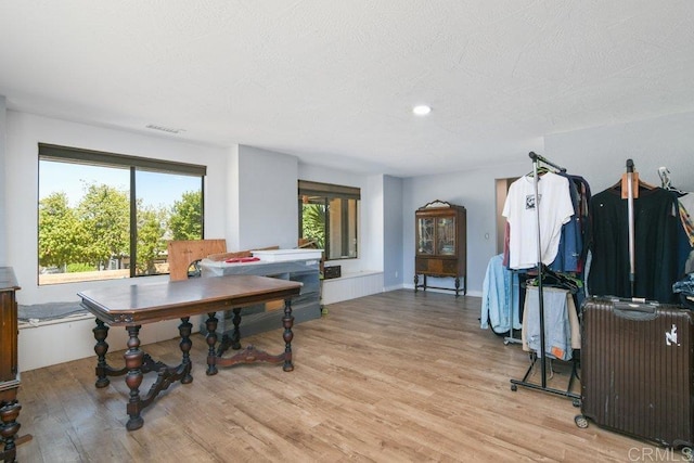 1736 Bellington Ln, Fallbrook, CA 92028 - office area featuring light wood-type flooring and a textured ceiling