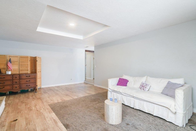 1736 Bellington Ln, Fallbrook, CA 92028 - living area with wood finished floors and a tray ceiling