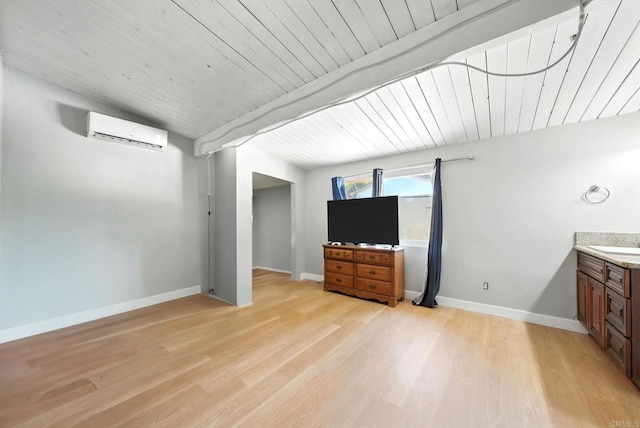 9738 Jamacha Blvd, Spring Valley, CA 91977 - unfurnished living room featuring an AC wall unit, light wood-style flooring, and wooden ceiling