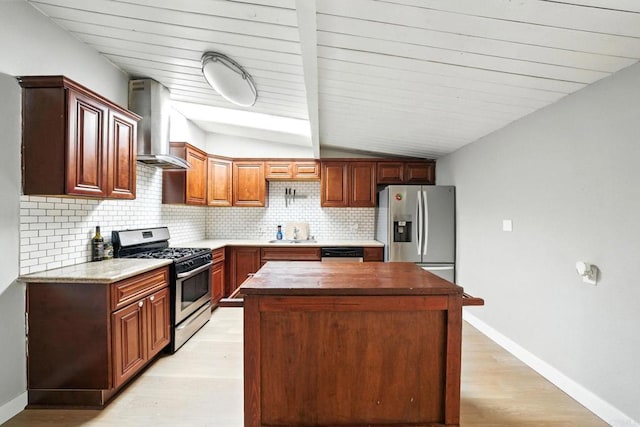 9738 Jamacha Blvd, Spring Valley, CA 91977 - kitchen featuring stainless steel appliances, wall chimney range hood, light wood-type flooring, tasteful backsplash, and vaulted ceiling