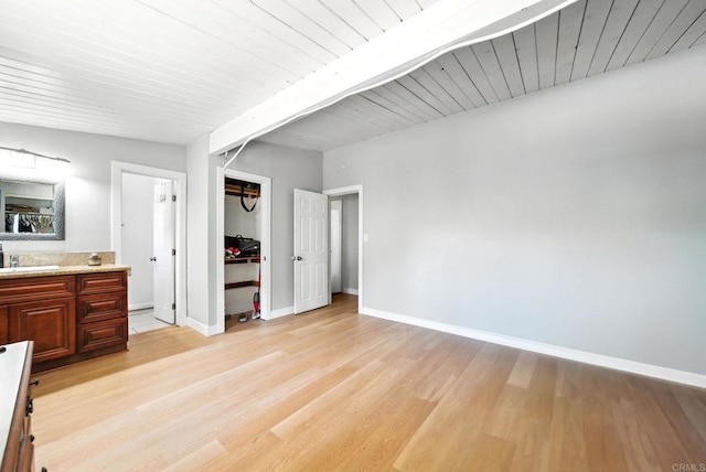 9738 Jamacha Blvd, Spring Valley, CA 91977 - unfurnished bedroom with light wood-style flooring, a closet, and connected bathroom