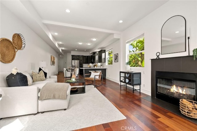 2620 Huntington Ln, Redondo Beach, CA 90278 - living area with dark wood finished floors, a fireplace, and recessed lighting