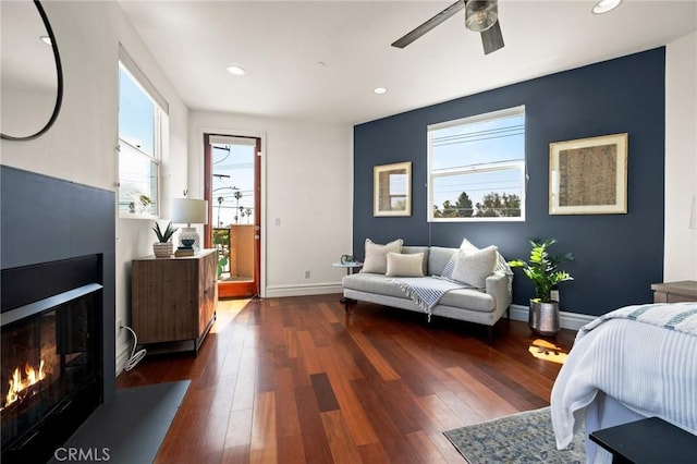 2620 Huntington Ln, Redondo Beach, CA 90278 - bedroom with a glass covered fireplace, dark wood-type flooring, recessed lighting, and a ceiling fan