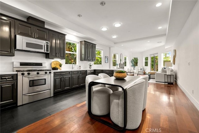 2620 Huntington Ln, Redondo Beach, CA 90278 - living area featuring dark wood-type flooring and recessed lighting