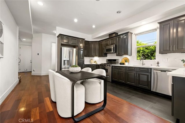 2620 Huntington Ln, Redondo Beach, CA 90278 - kitchen with stainless steel appliances, dark wood-style flooring, light countertops, and recessed lighting