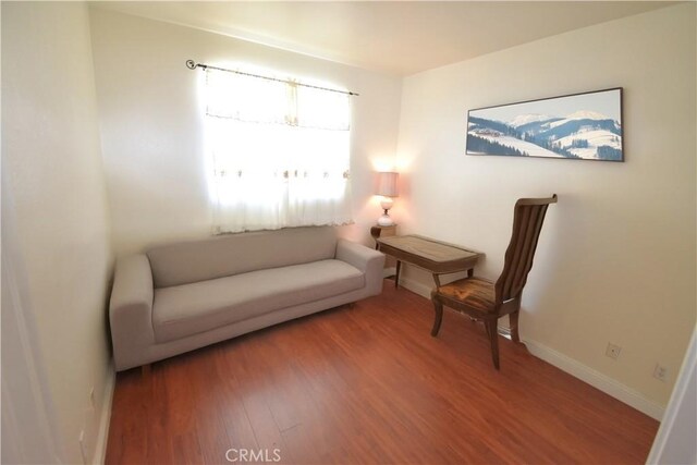 13647 Mesa Linda Ave, Victorville, CA 92392 - living area featuring wood finished floors and baseboards