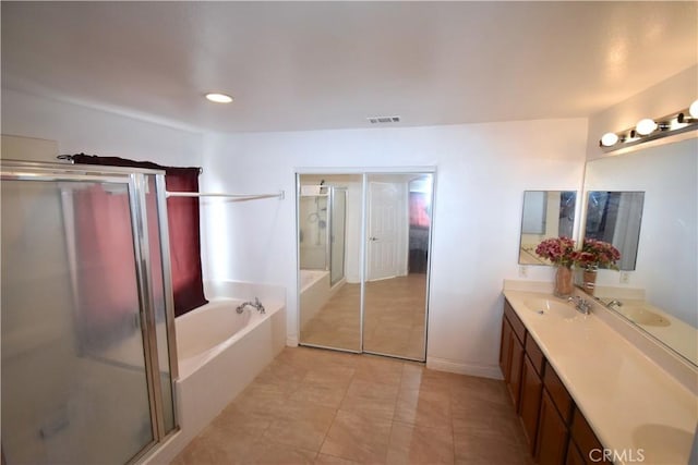 13647 Mesa Linda Ave, Victorville, CA 92392 - bathroom with double vanity, a shower stall, a bath, and tile patterned flooring