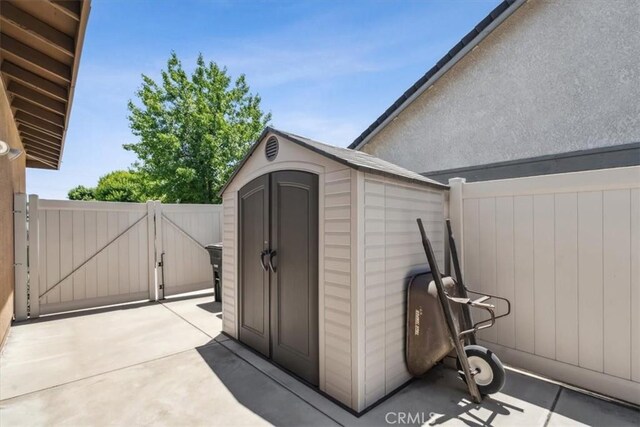 232 Loretta Way, Calimesa, CA 92320 - view of shed featuring a gate