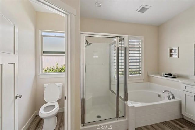 232 Loretta Way, Calimesa, CA 92320 - bathroom with a stall shower, a bath, and wood finished floors