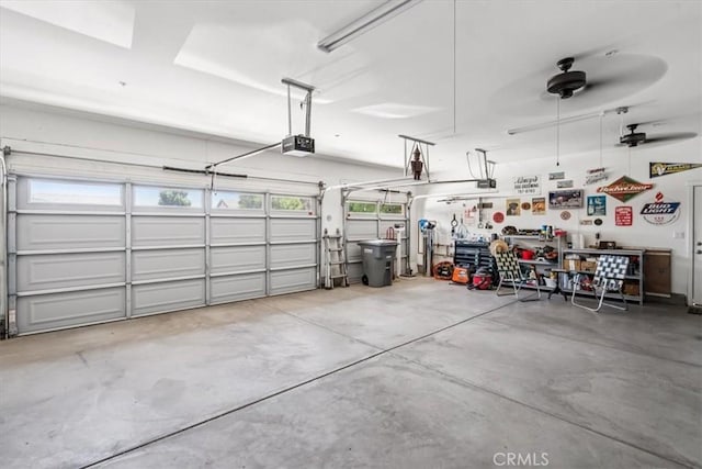232 Loretta Way, Calimesa, CA 92320 - garage with a garage door opener and a ceiling fan