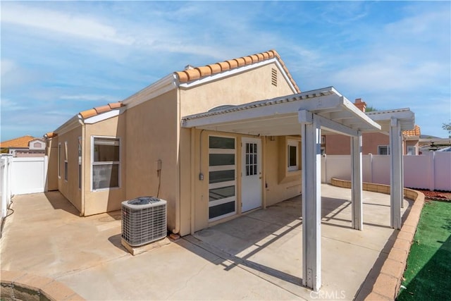 28076 Orangegrove Ave, Menifee, CA 92584 - rear view of house with a patio area, stucco siding, a fenced backyard, and a tiled roof