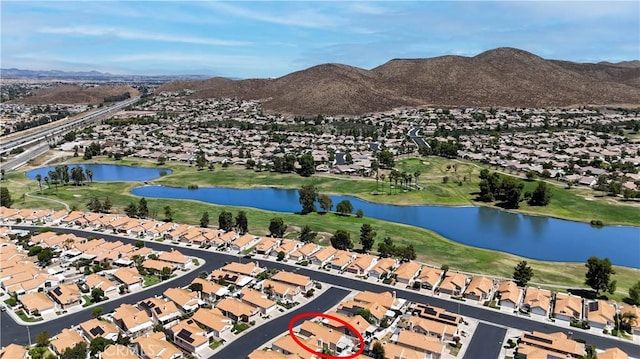 28076 Orangegrove Ave, Menifee, CA 92584 - aerial overview of property's location with nearby suburban area and a water and mountain view
