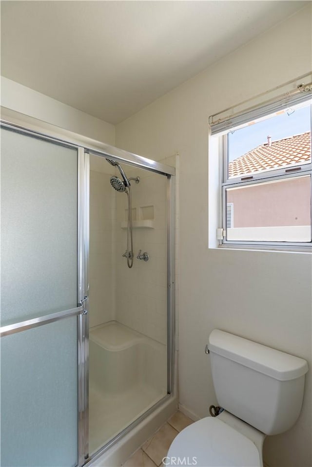 28076 Orangegrove Ave, Menifee, CA 92584 - full bathroom with a shower stall and tile patterned floors