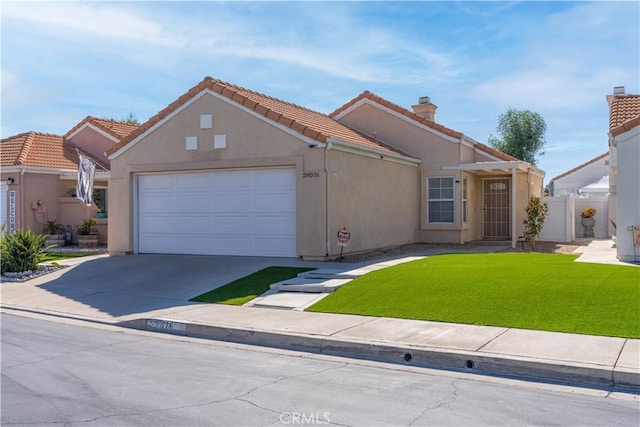 28076 Orangegrove Ave, Menifee, CA 92584 - view of front of home with stucco siding, an attached garage, driveway, a tile roof, and a chimney