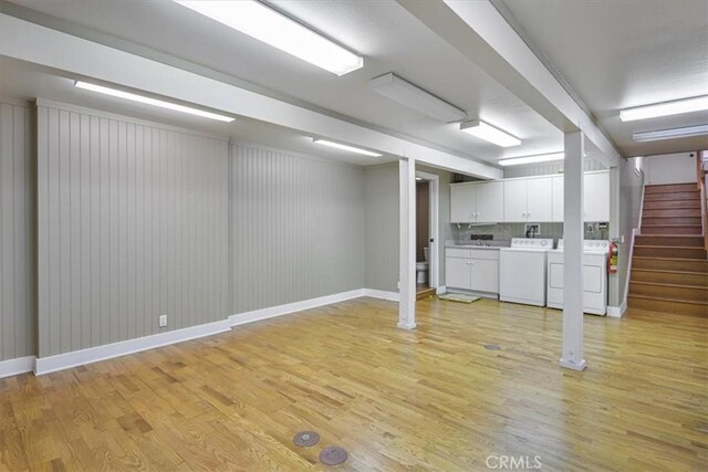 625 High Dr, Laguna Beach, CA 92651 - finished basement featuring washer and clothes dryer, light wood-style flooring, and stairway