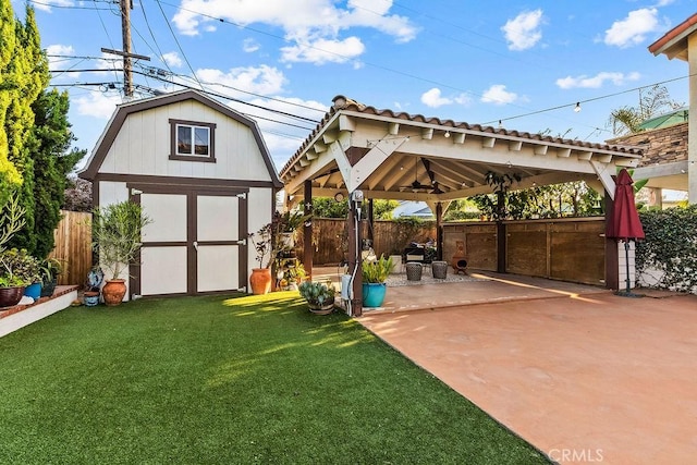 34283 Via Lopez, Dana Point, CA 92624 - fenced backyard with a gazebo, a storage unit, ceiling fan, and a patio area