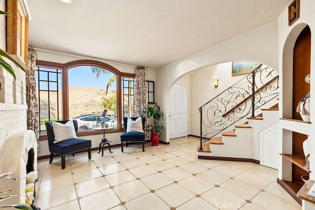 34283 Via Lopez, Dana Point, CA 92624 - entrance foyer featuring arched walkways, light flooring, and stairway