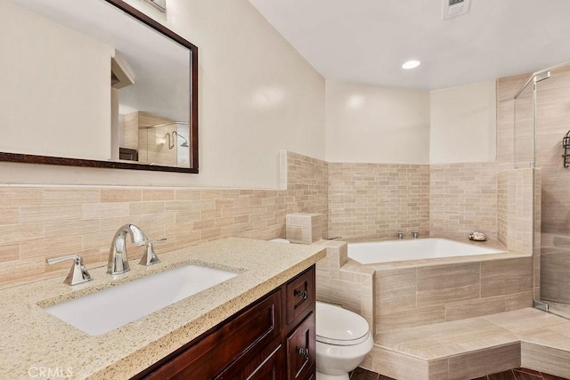 34283 Via Lopez, Dana Point, CA 92624 - full bath with a garden tub, a shower stall, vanity, and tile walls