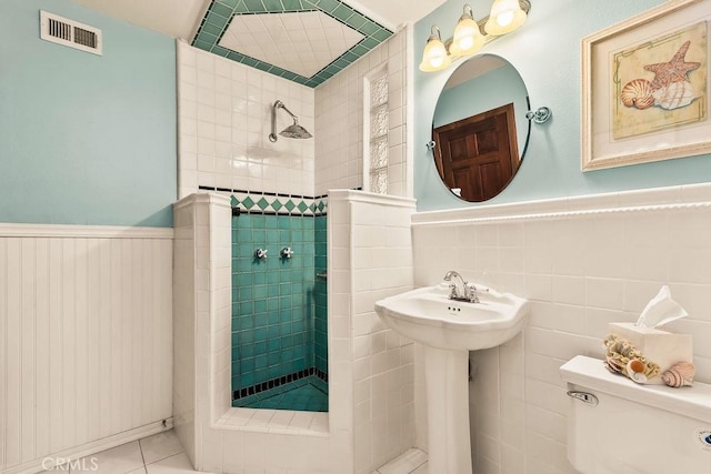 34283 Via Lopez, Dana Point, CA 92624 - full bathroom with a walk in shower, a wainscoted wall, and tile patterned flooring