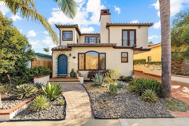 34283 Via Lopez, Dana Point, CA 92624 - mediterranean / spanish house with a chimney, stucco siding, a tile roof, and french doors