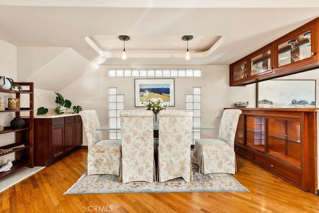 34283 Via Lopez, Dana Point, CA 92624 - dining area with light wood-style flooring and a tray ceiling