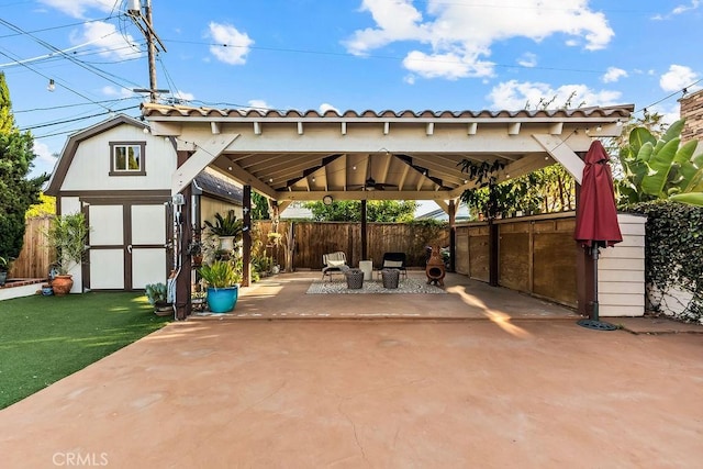 34283 Via Lopez, Dana Point, CA 92624 - fenced backyard featuring a gazebo, ceiling fan, a patio, and a storage shed