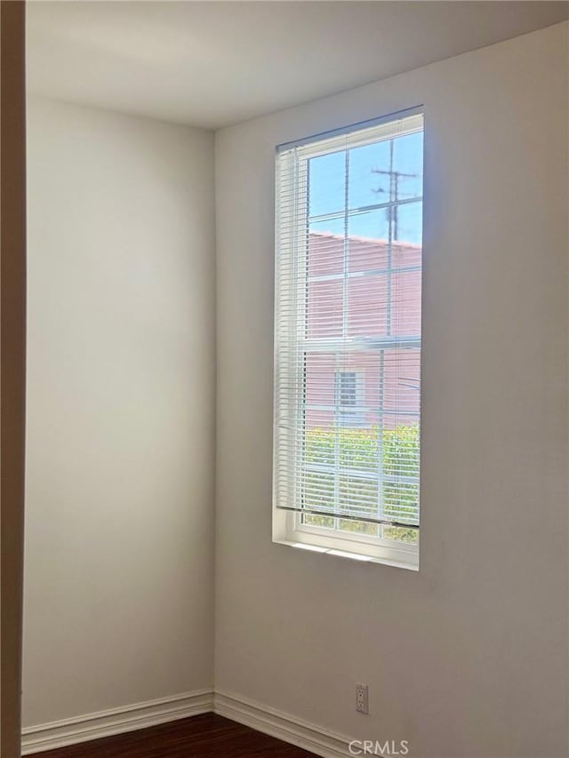 1809 S 5th St, Alhambra, CA 91803 - empty room featuring healthy amount of natural light and dark wood-type flooring