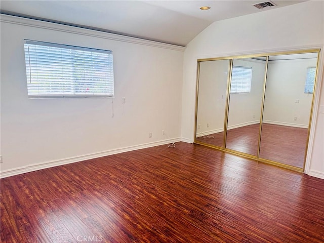 1809 S 5th St, Alhambra, CA 91803 - unfurnished bedroom featuring wood finished floors, vaulted ceiling, and a closet