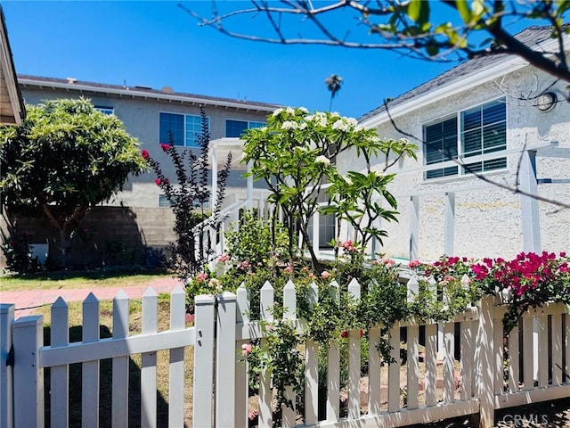 1809 S 5th St, Alhambra, CA 91803 - view of front of home with a fenced front yard and stucco siding