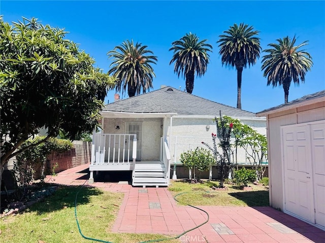 1809 S 5th St, Alhambra, CA 91803 - back of property with stucco siding and a shingled roof