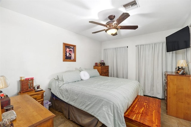 4234 Center Ave, Norco, CA 92860 - tiled bedroom with a ceiling fan
