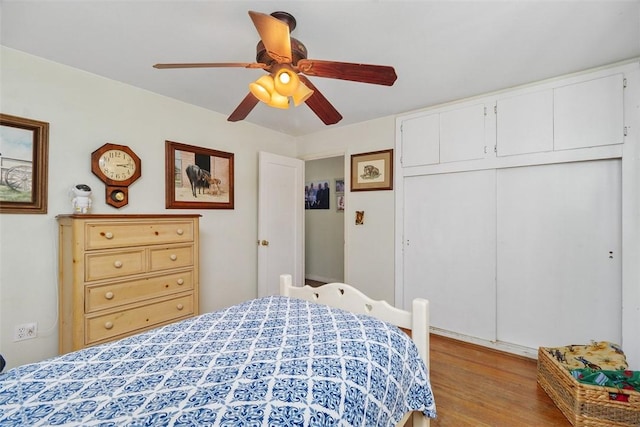 4234 Center Ave, Norco, CA 92860 - bedroom featuring a closet, wood finished floors, and a ceiling fan