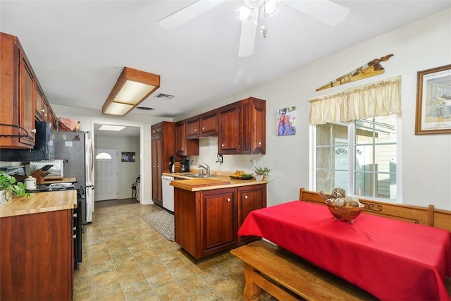 4234 Center Ave, Norco, CA 92860 - kitchen with white dishwasher, ceiling fan, and stove