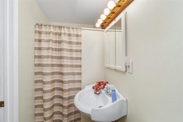4234 Center Ave, Norco, CA 92860 - full bathroom with a sink and curtained shower