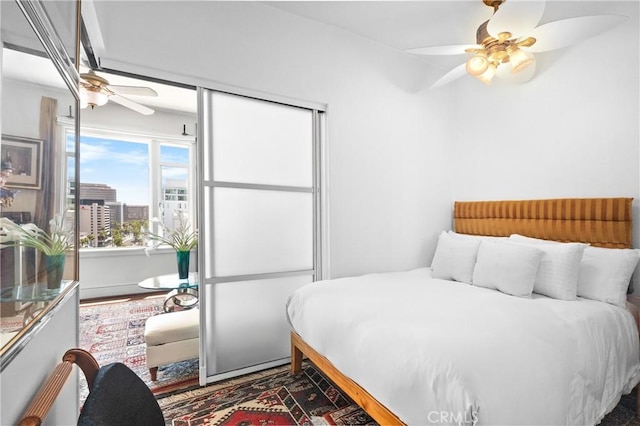 360 W Ocean Blvd Unit 1103, Long Beach, CA 90802 - bedroom with a ceiling fan and a city view