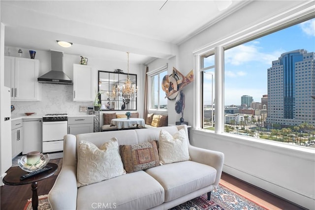 360 W Ocean Blvd Unit 1103, Long Beach, CA 90802 - living room with wood finished floors, a city view, and a chandelier