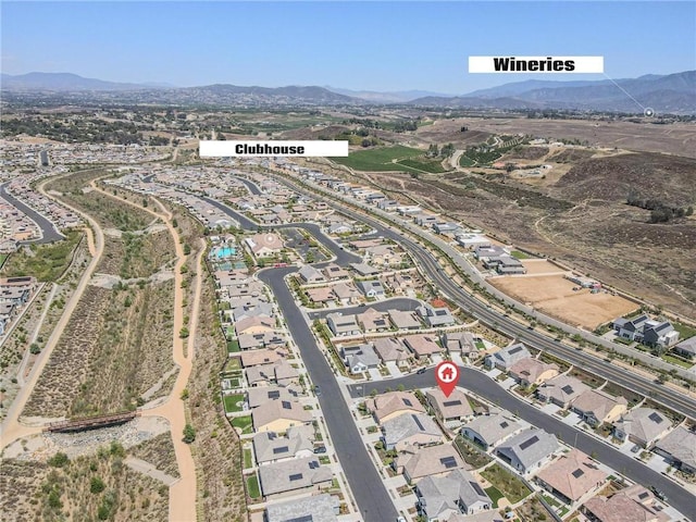 32096 Hyacinth Way, Temecula, CA 92591 - aerial overview of property's location featuring a mountain backdrop and nearby suburban area