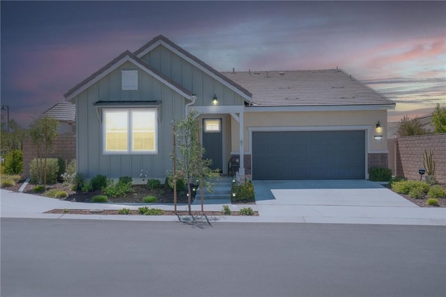 32096 Hyacinth Way, Temecula, CA 92591 - view of front facade featuring board and batten siding, an attached garage, and concrete driveway