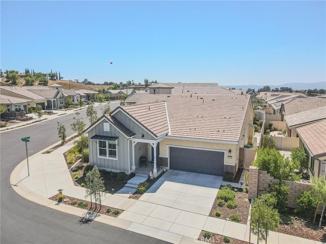 32096 Hyacinth Way, Temecula, CA 92591 - view of front facade featuring board and batten siding, a residential view, and driveway