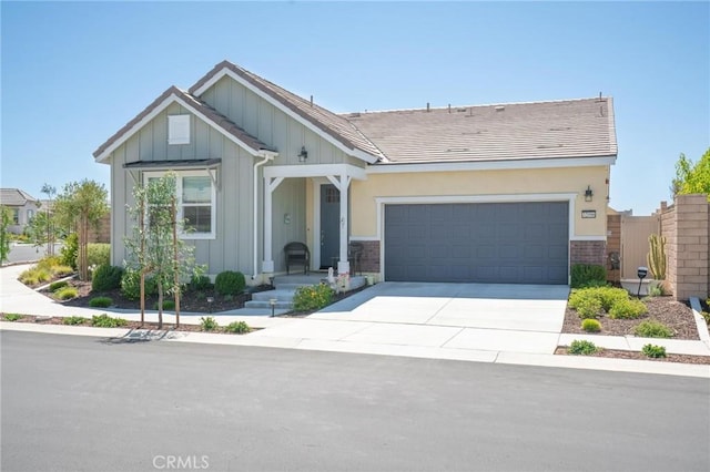 32096 Hyacinth Way, Temecula, CA 92591 - view of front of property with board and batten siding, concrete driveway, and an attached garage