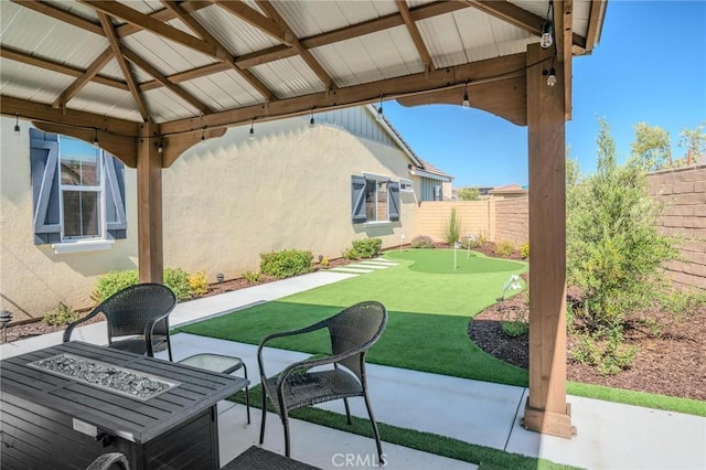 32096 Hyacinth Way, Temecula, CA 92591 - fenced backyard with an area to practice putting, a fire pit, a gazebo, and a patio
