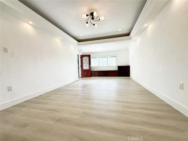 528 S Avington Ave, West Covina, CA 91790 - empty room featuring ornamental molding, a chandelier, and a raised ceiling