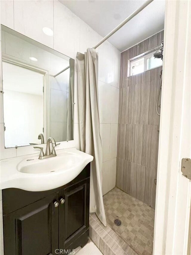528 S Avington Ave, West Covina, CA 91790 - bathroom featuring vanity and a stall shower