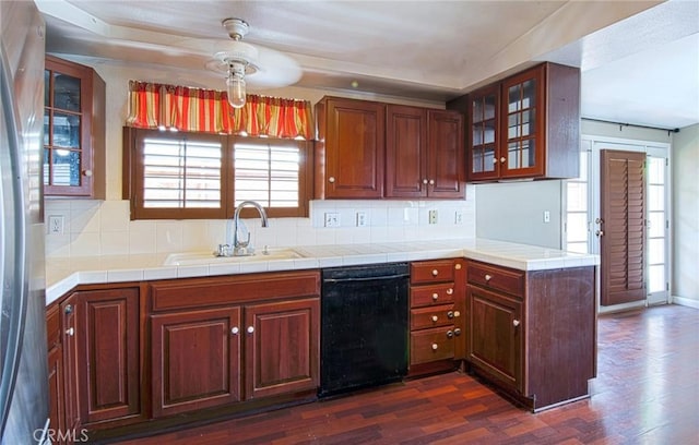 267 E 16th St, Costa Mesa, CA 92627 - kitchen with dishwasher, freestanding refrigerator, dark wood-type flooring, and tasteful backsplash
