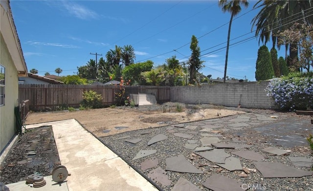 267 E 16th St, Costa Mesa, CA 92627 - fenced backyard with a patio