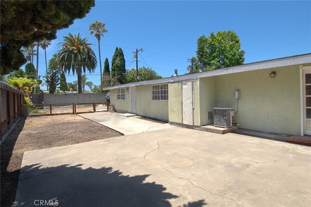 267 E 16th St, Costa Mesa, CA 92627 - rear view of house featuring a patio area, a fenced backyard, and stucco siding