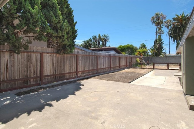 267 E 16th St, Costa Mesa, CA 92627 - fenced backyard featuring a patio