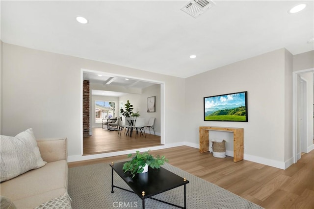 1347 W Princeton St, Ontario, CA 91762 - living room featuring wood finished floors and recessed lighting